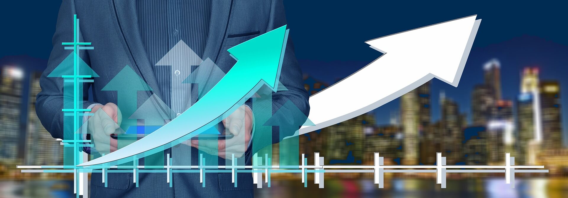 Graph with arrows going up. Image of city in the background.